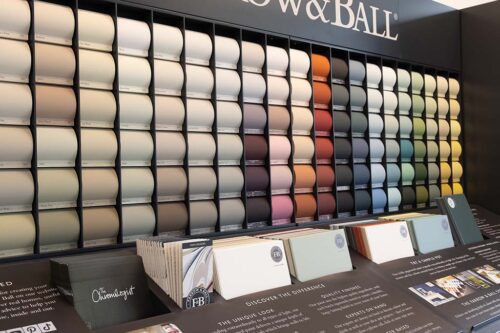 Farrow & Ball paint color swatches in a paint supply store